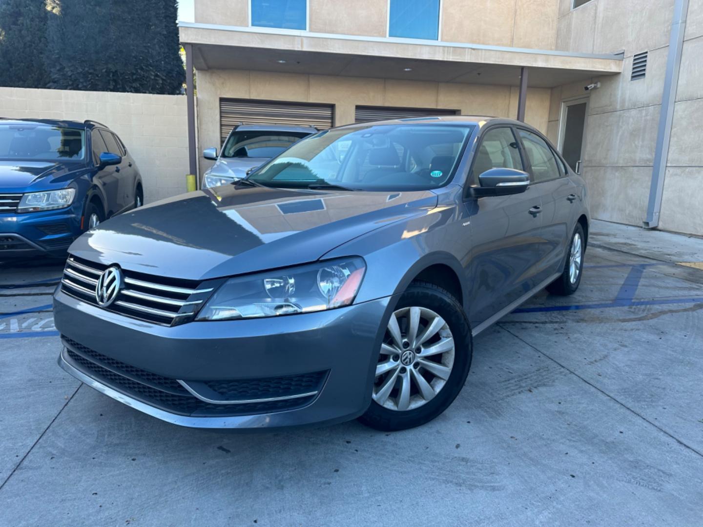 2015 Gray /Black Volkswagen Passat leather (1VWAT7A39FC) with an 4 CYLINDER engine, Automatic transmission, located at 30 S. Berkeley Avenue, Pasadena, CA, 91107, (626) 248-7567, 34.145447, -118.109398 - iscover Refined German Engineering: 2015 VW Passat Wolfsburg Edition - Now at Our Pasadena, CA Dealership Embrace the perfect blend of luxury and performance with the 2015 VW Passat Wolfsburg Edition, available at our BHPH dealership in Pasadena, CA. This exquisite model symbolizes Volkswagen's c - Photo#0